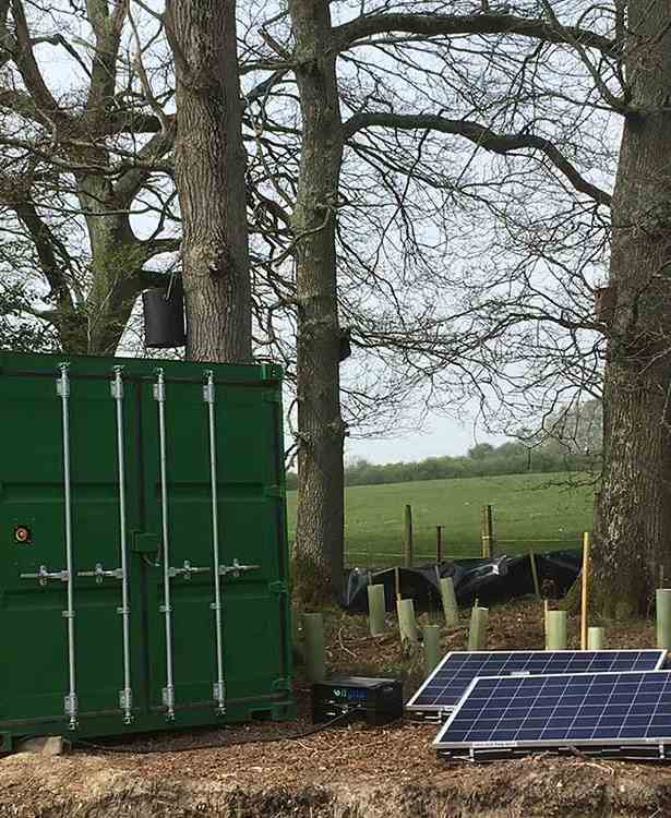 A hybrid generator connected to solar panels)